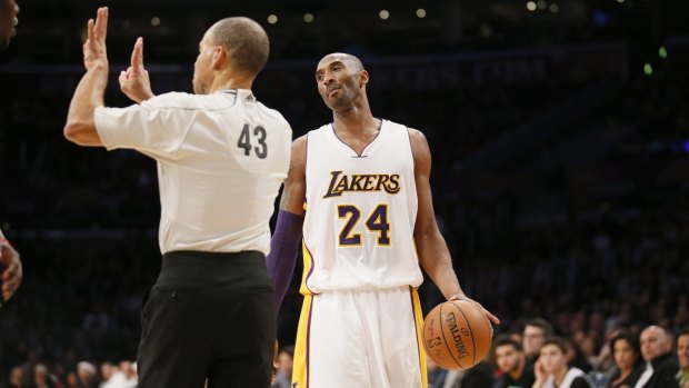 Not happy: Kobe Bryant is called for an offensive foul during the loss to the Pelicans.