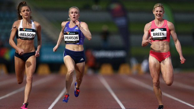 Ella Nelson of Victoria, Sally Pearson of Queensland and Melissa Breen compete in the women's 200 metres final at Sydney Olympic Park on Saturday.