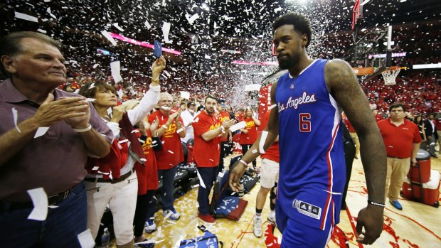 Abrupt finish: Clippers centre DeAndre Jordan heads for the locker room after LA lost to Houston.
