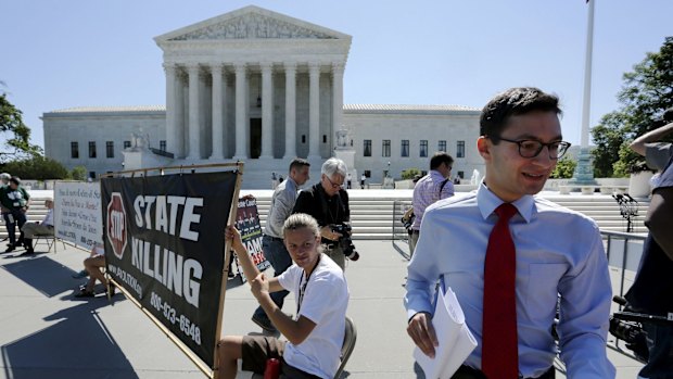 Demonstrators in front of the US Supreme Court building in Washington.