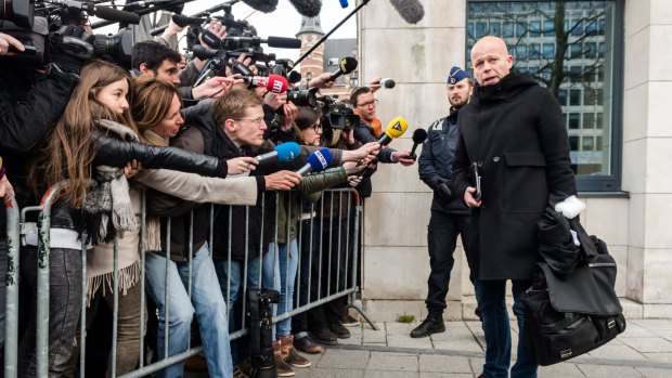 Salah Abdeslam's lawyer Sven Mary talks with journalists outside a justice building in Brussels on Thursday.
