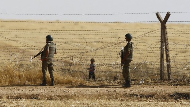 The security fence on the Turkish-Syrian border, near the south-eastern town of Akcakale in Turkey's Sanliurfa province. 