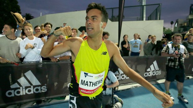 Luke Matthews of Australia celebrates after running an Olympic qualifying time in the 800m.