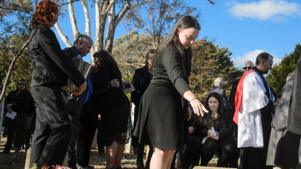 Charlotte Jeffery at the funeral of her grandfather Val Jeffery at the Queanbeyan Lawn Cemetery on Wednesday.