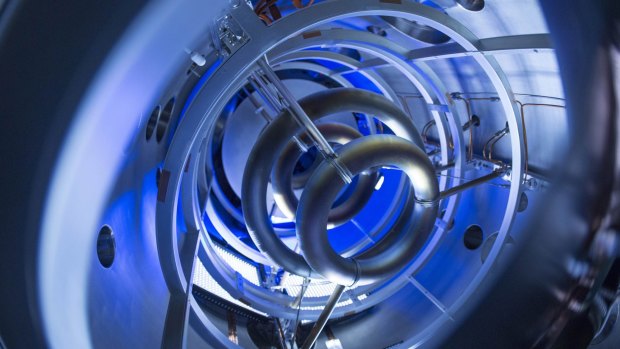 The magnetic coils inside the compact fusion experiment are critical to plasma containment.