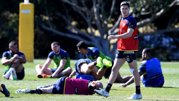 Preparing: Mitchell Moses and Eels players go through their paces.