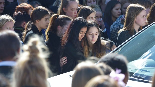 Masa Vukotic's friends hugged as they said goodbye to the Canterbury Girls' Secondary College student.