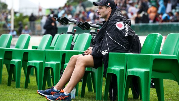 Still waiting: Kieran Foran sits on the bench during an NRL trial match earlier this year.