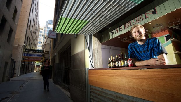 Bar with a conscience: Simon Griffiths' non-profit Shebeen livens up Manchester Lane.