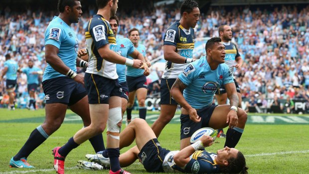 Bragging rights: The Waratahs and Brumbies meet again as teammates after their epic clash in Sydney.