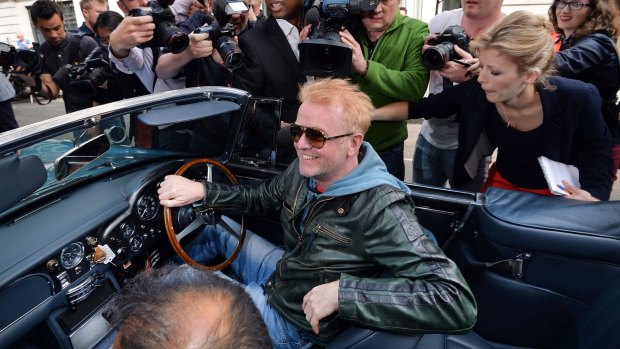 New Top Gear host Chris Evans at the wheel of his vintage Aston Martin.
