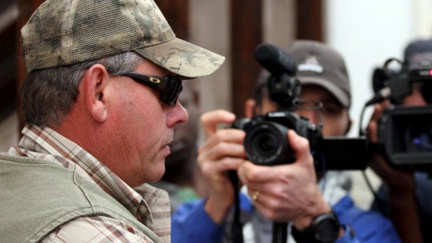 Theo Bronkhorst talks to media outside the Hwange magistrates court.