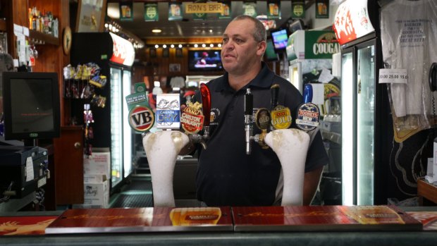 Sombre mood: Nambucca Hotel publican Chris McDonald says Macksville is in shock over the untimely death of favourite son Phillip Hughes.