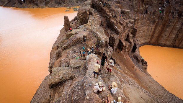 Freelance jade miners are seen on a jade mountain in Hpakant area of Kachin State, Northern Myanmar last year.