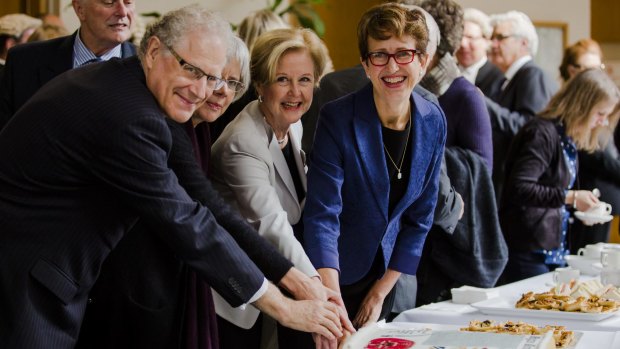 Justice Richard Refshauge, Justice Hilary Penfold, Emeritus Professor Gillian Triggs, and Chief Justice Helen Murrell, cutting the Magna Carta cake.