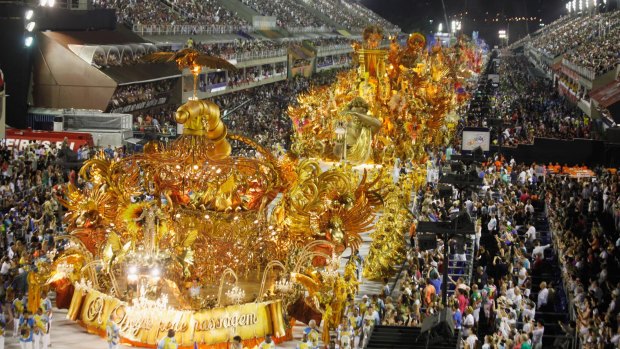 The Beija-Flor samba school parades in the Sambodrome at the Champion's Parade on February 13 in Rio. Large floats will not fit through the door at Maracana.
