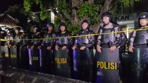 Riot police gather outside Kerobokan prison for the transfer.