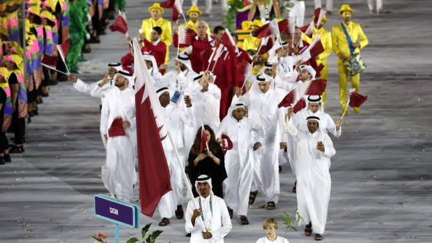 Qatar's flag bearer Sheikh Ali al-Thani leads his team of imports during the Rio 2016 Opening Ceremony on Friday.
