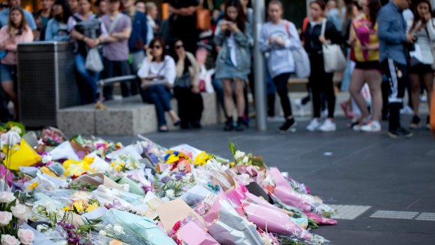 Part of Bourke Street Mall has become a shrine to victims of Friday's tragedy.