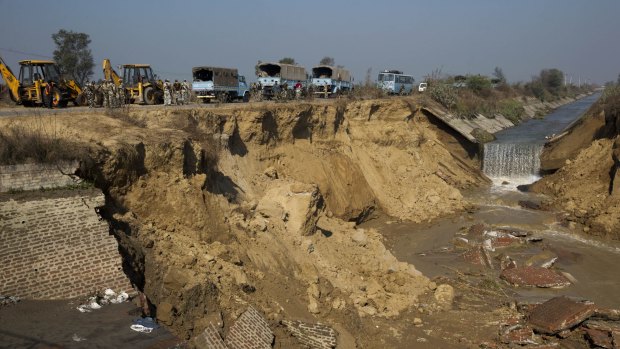 A damaged section of the Munak canal. Fears of a water crisis in the Indian capital eased on Monday after security forces took control of the canal. 