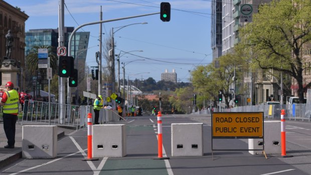 Anti-terror bollards have been set up along the grand final parade route on Spring Street.