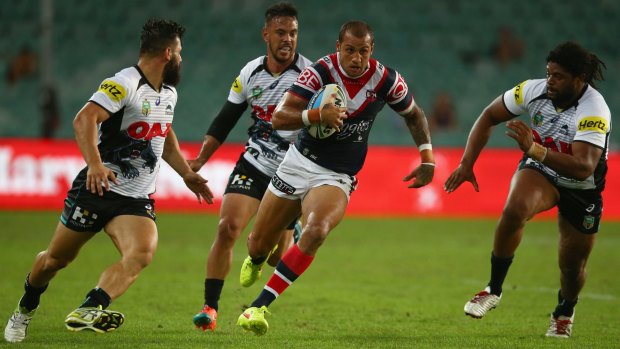 Raiders reunion: Blake Ferguson makes a break for the Sydney Roosters during the round three NRL match against the Penrith Panthers at Allianz Stadium.