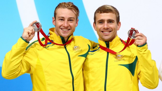 Matthew Mitcham and Grant Nel with their silver medals.