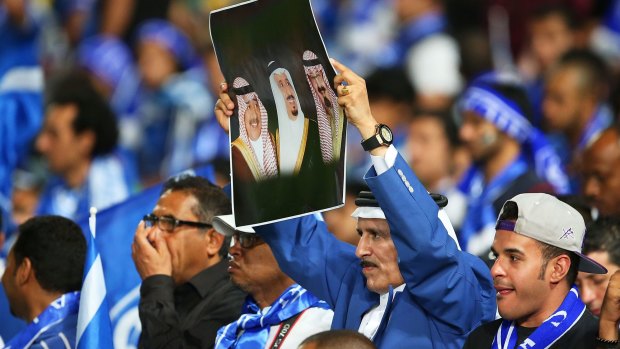 Al-Hilal fans show their colours during the first leg of the Asian Champions League final  against the Wanderers.