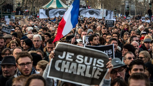 Demonstrators make their way along Place de la Republique in Paris after the terrorist attacks on the Charlie Hebdo satirical newspaper in January 2015.