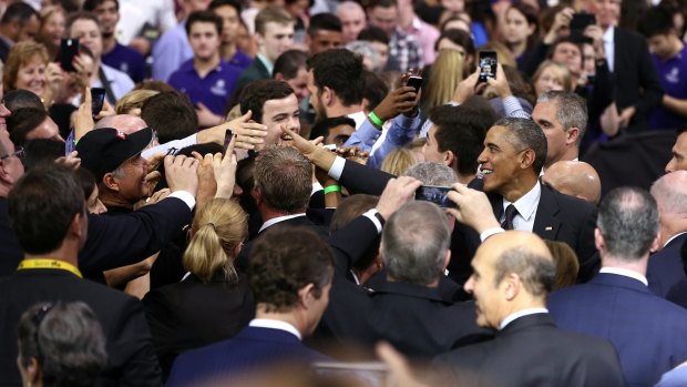 US President Barack Obama greets people after delivering his speech at the University of Queensland.
