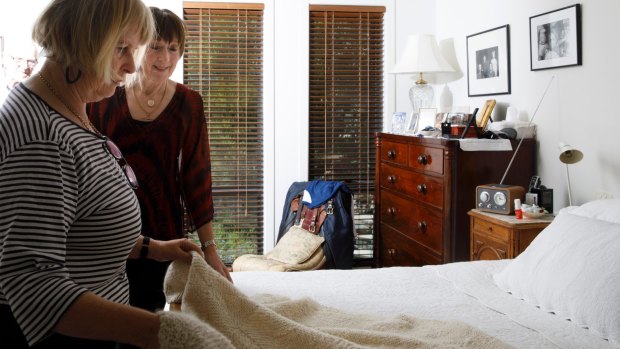After the 2003 Canberra fires destroyed Janet Walker's (right) home, neighbour, close friend, and accomplished knitter Jenny Manning said that she would knit Janet a special blanket if she agreed to stay and rebuild. The blanket has stayed on the Walkers bed for 15 years.