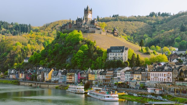 Reichsburg Imperial Castle crowns the hill above Cochem on the Moselle River in Germany.