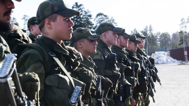 Young recruits during an inspection in Enkoping 70 km north-west of Stockholm, Sweden, on Thursday. 