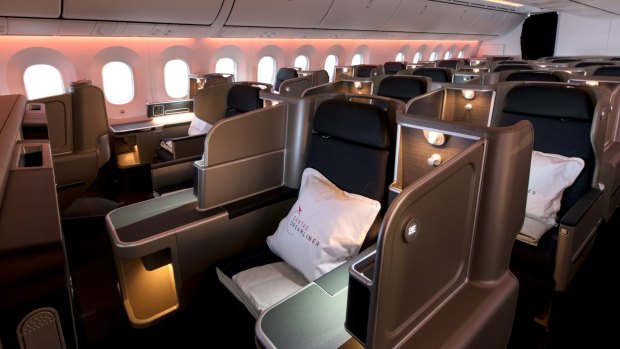 The Qantas 787 Dreamliner business class cabin. You're much more likely to get an upgrade if you have high status with an airline.