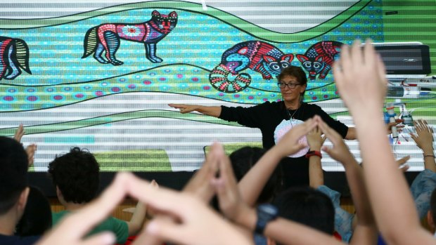 Australian children's book writer Bronwyn Bancroft interacts with students at the Beijing Fangcaodi International School during Australian Writers' Week.