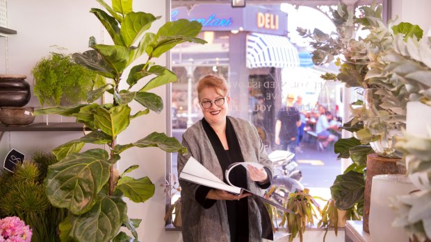 ''It's where my heart is,'' says Flowers Vasette owner Cherrie Miriklis-Pavlou, about Brunswick Street, Fitzroy. Her family has run shops on the street for 80 years. She features in a sumptuous new book about the street. 