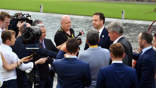 Australian Trade Minister Steven Ciobo, centre right, speaks to the media. 