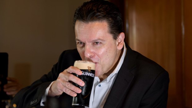 Nick Xenophon toasts the news that he's a British citizen earlier this year. 