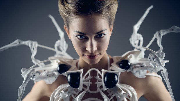 The Spider Dress 2.0, by Anouk Wipprecht, raises its arms to 'attack' if a stranger gets too close. 