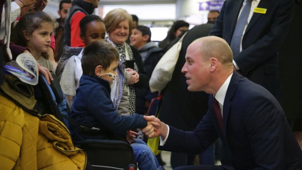 Prince William meets patients as he visits the Evelina London Children's Hospital.