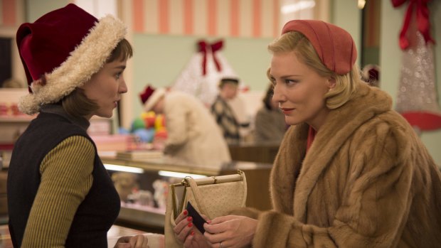 Rooney Mara, left, as Therese Belivet, and Cate Blanchett, as Carol Aird, in a scene from the lesbian romance drama, Carol. 