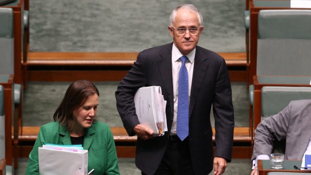 Prime Minister Malcolm Turnbull and Assistant Treasurer Kelly O'Dwyer arrive for question time on Wednesday.