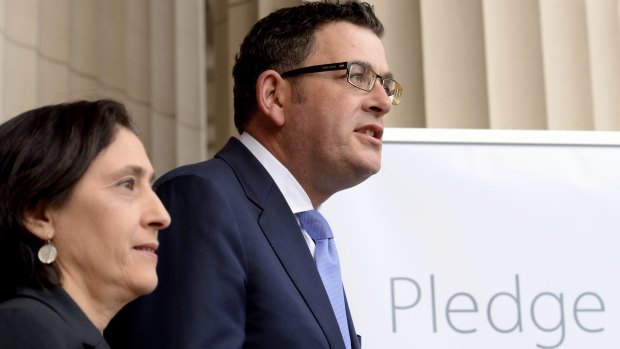 Victorian  Premier Daniel Andrews and Minister Lily D'Ambrosio promise net zero emissons by 2050. 
