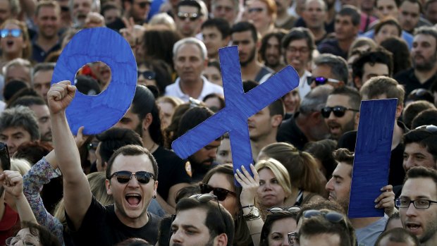 Demonstrators hold up letters spelling the word "No" in Greek during an anti-austerity rally in Syntagma Square in Athens on Friday.