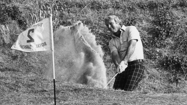 July 1976: Arnold Palmer hits a shot from the bunker onto the green during a match at the Royal Birkdale, Lancashire.