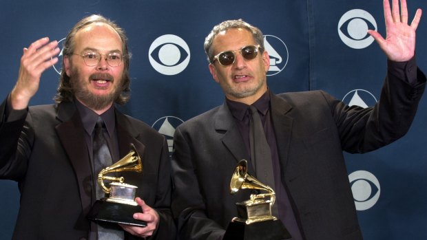 Walter Becker, left, and Donald Fagen of Steely Dan show off their award for best pop vocal album for "Two Against Nature", Los Angeles, 2001.