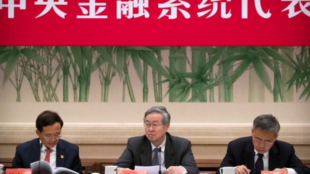 Zhou Xiaochuan, centre, governor of the People's Bank of China.