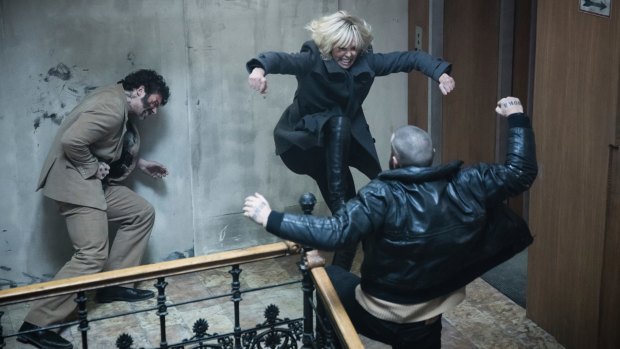 Charlize Theron, centre, punches through her paces in <i>Atomic Blonde</i>.