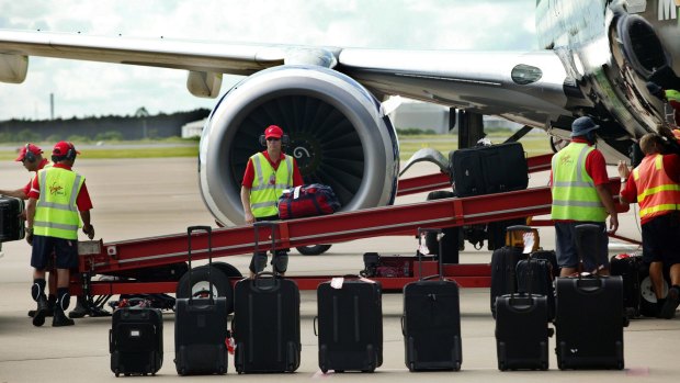 Baggage handlers will face random security checks under new measures announced by the federal government. 