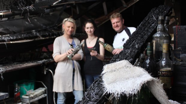 Owner Kate Richards, manager Courtney Parker and owner Allen St James inside the Armidale Club in late 2016 after it was destroyed by fire.